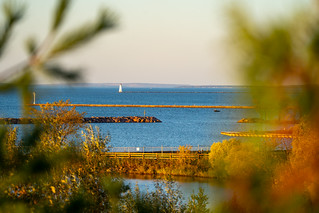 View of the Ashland Breakwater Lighthouse on Lake Superior in Wisconsin, natural framing composition