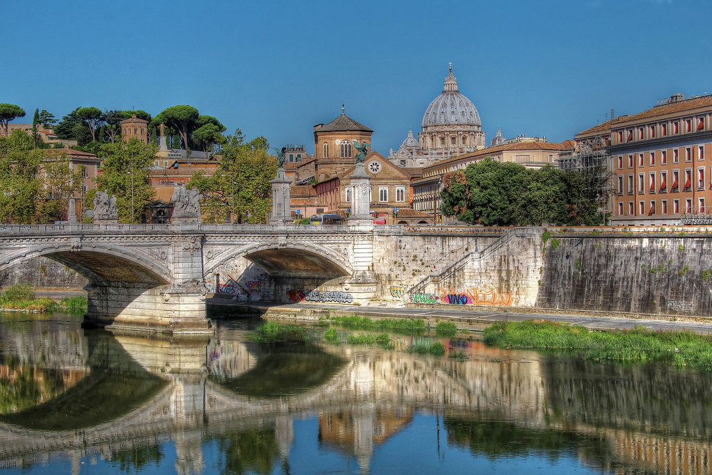 Walking along the Tiber River going to the Vatican.