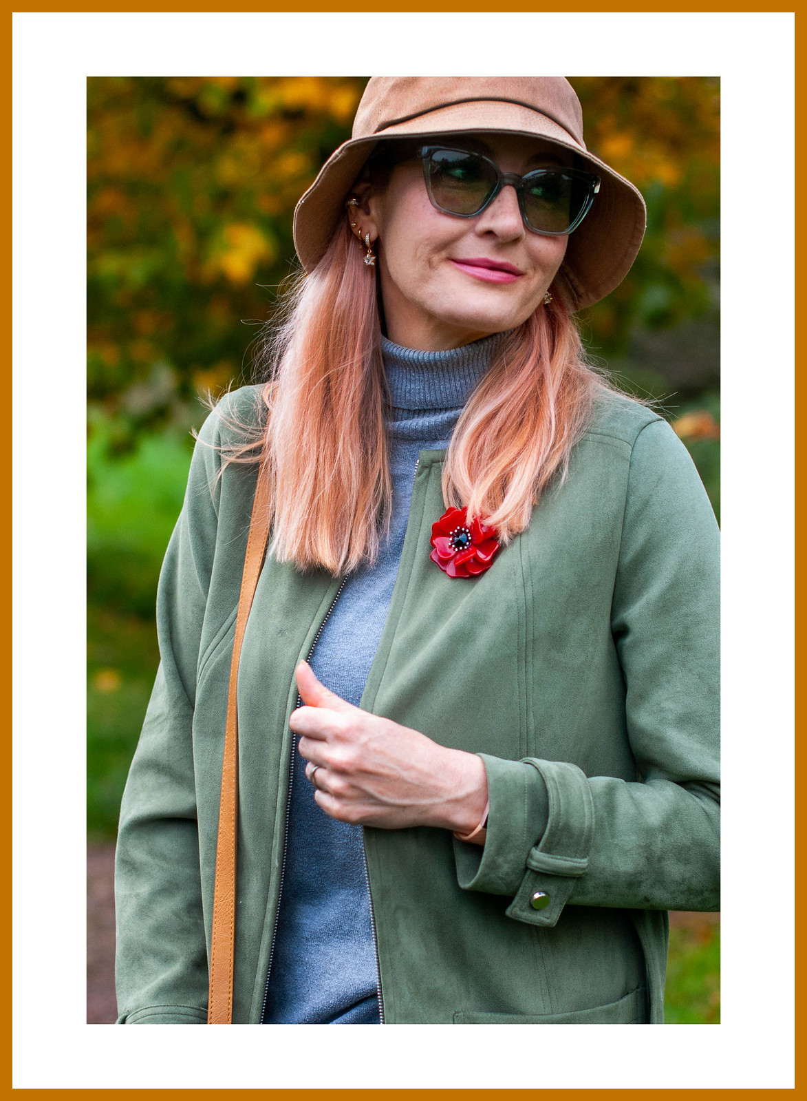 Styling That 90s Favourite, the Bucket Hat (worn with olive green longline jacket, jeans, grey roll neck sweater and brown knee-high boots) | Not Dressed As Lamb, Over 40 Style