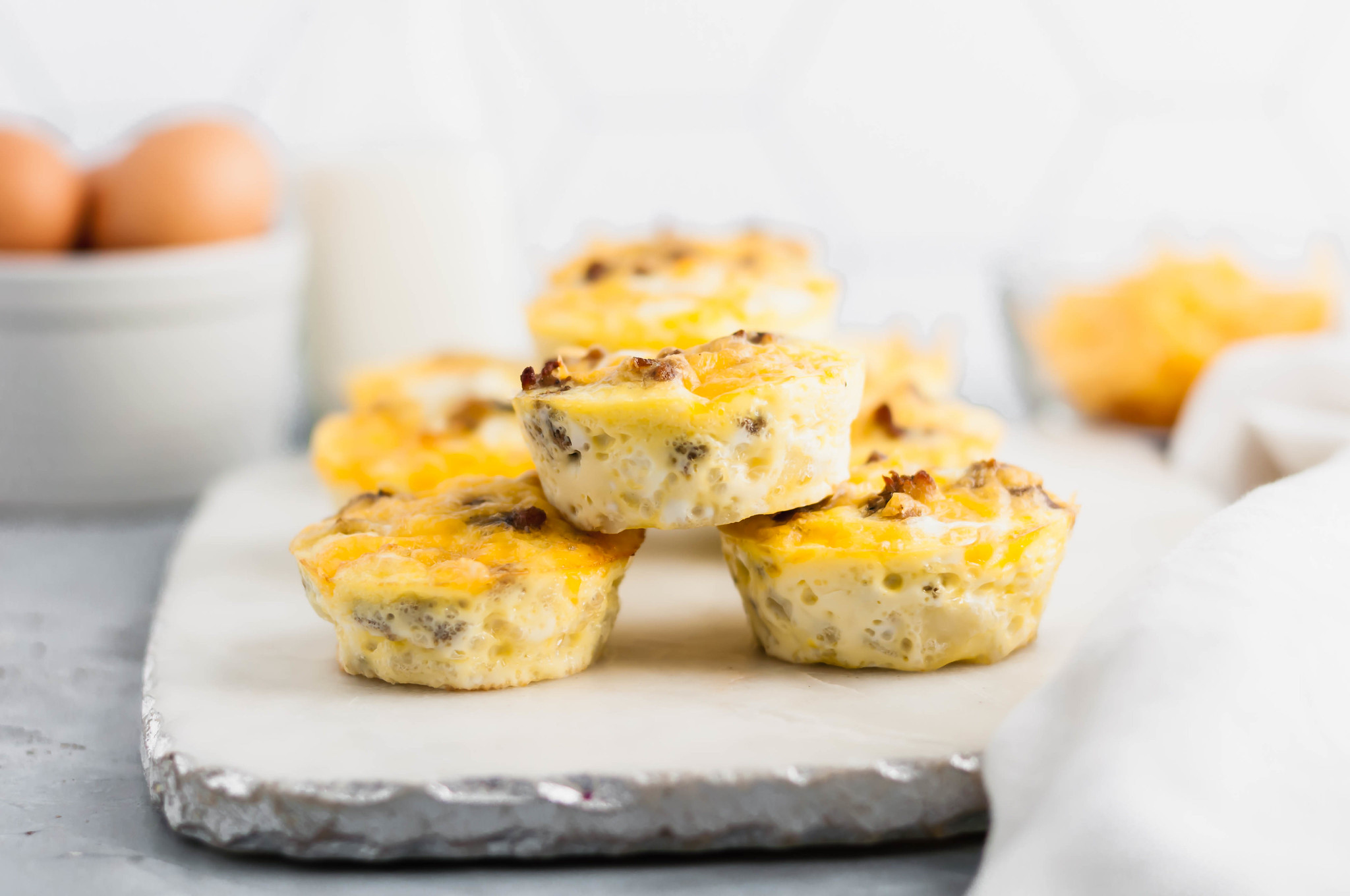 Have breakfast casserole any time with these Individual Breakfast Casserole Bites. Perfect for brunch, holiday breakfast or any day of the week. Make ahead friendly and great for feeding a crowd. Customize these with your favorite breakfast casserole ingredients.