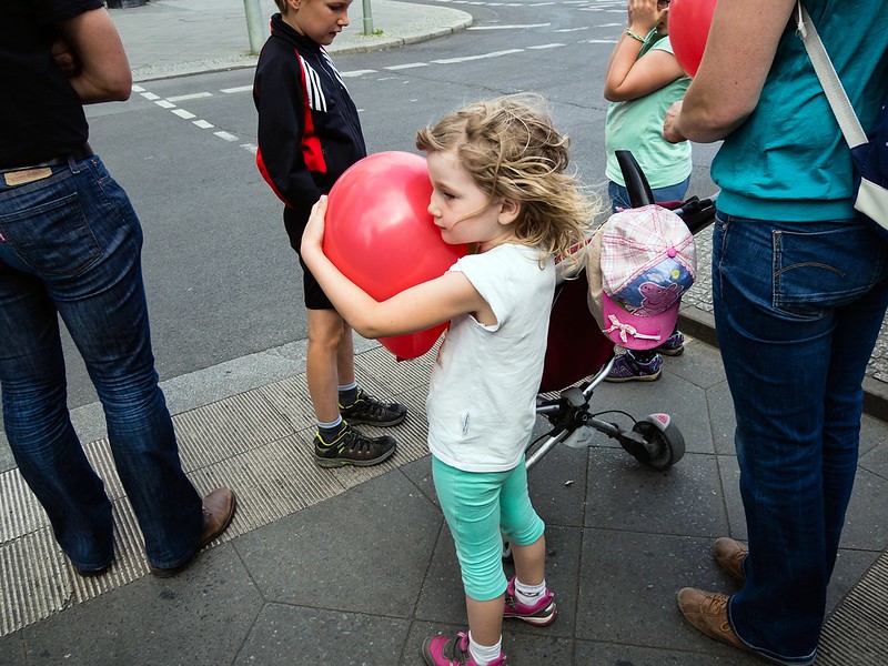 The little girl with the red balloon