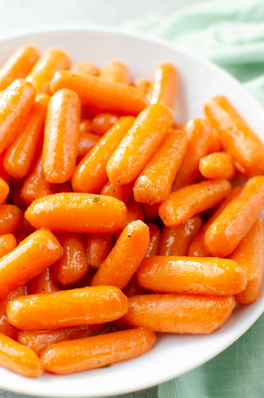Glazed Ranch Carrots - the perfect side dish for any dinner! Baby carrots tossed in a delicious buttery ranch glaze. 
