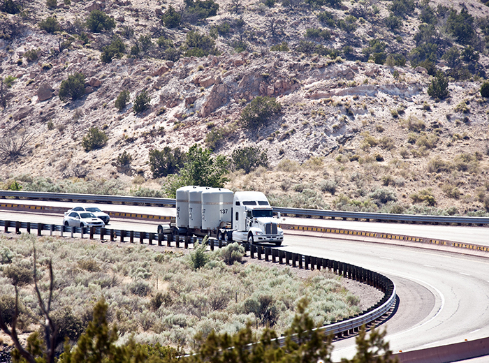 A truck driving on the highway.