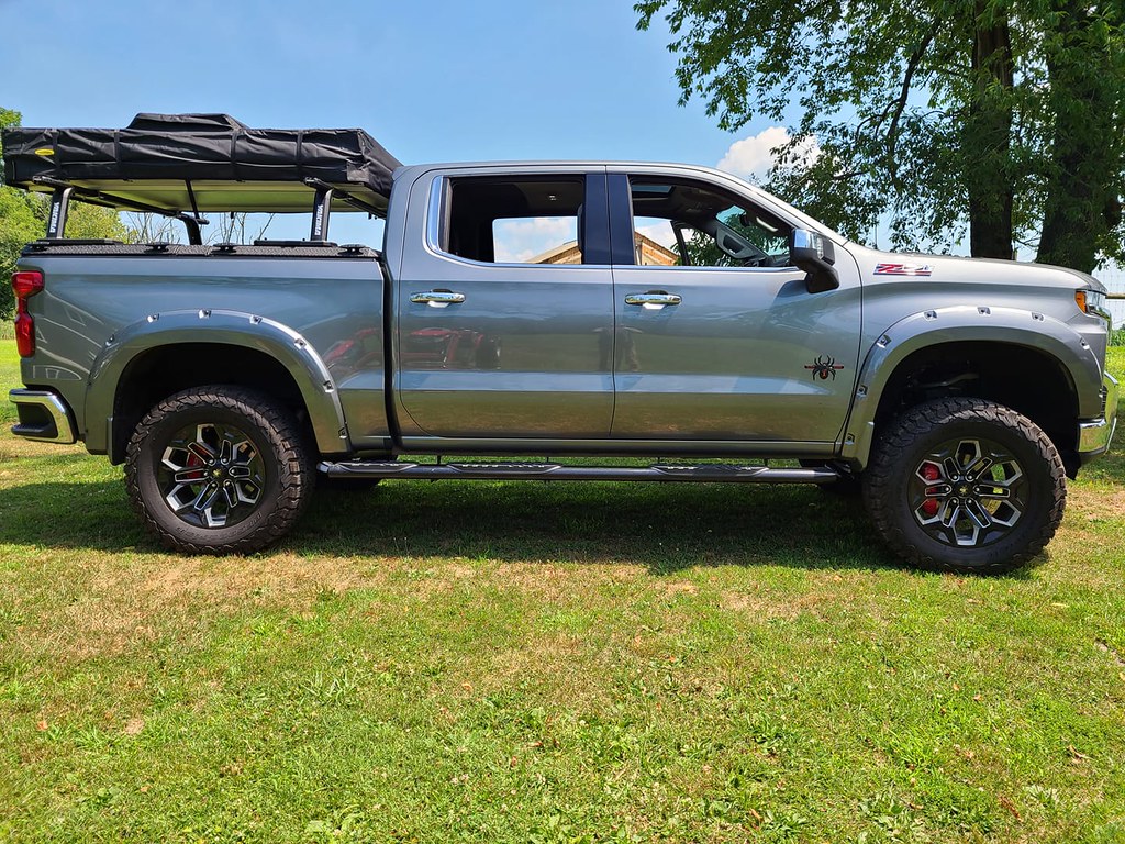 A Heavy Duty Truck Bed Cover and Rooftop Tent Rack on a Chevy/GMC Silverado/Sierra