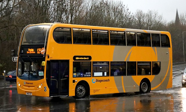 Stagecoach Merseyside (Glenvale Transport) 15247 YN65XEY now repainted into the yellow based 'Longer Distance Routes' livery ex 'GOLD' captured in Bamber Bridge today with a Preston bound 125 service in torrential rain