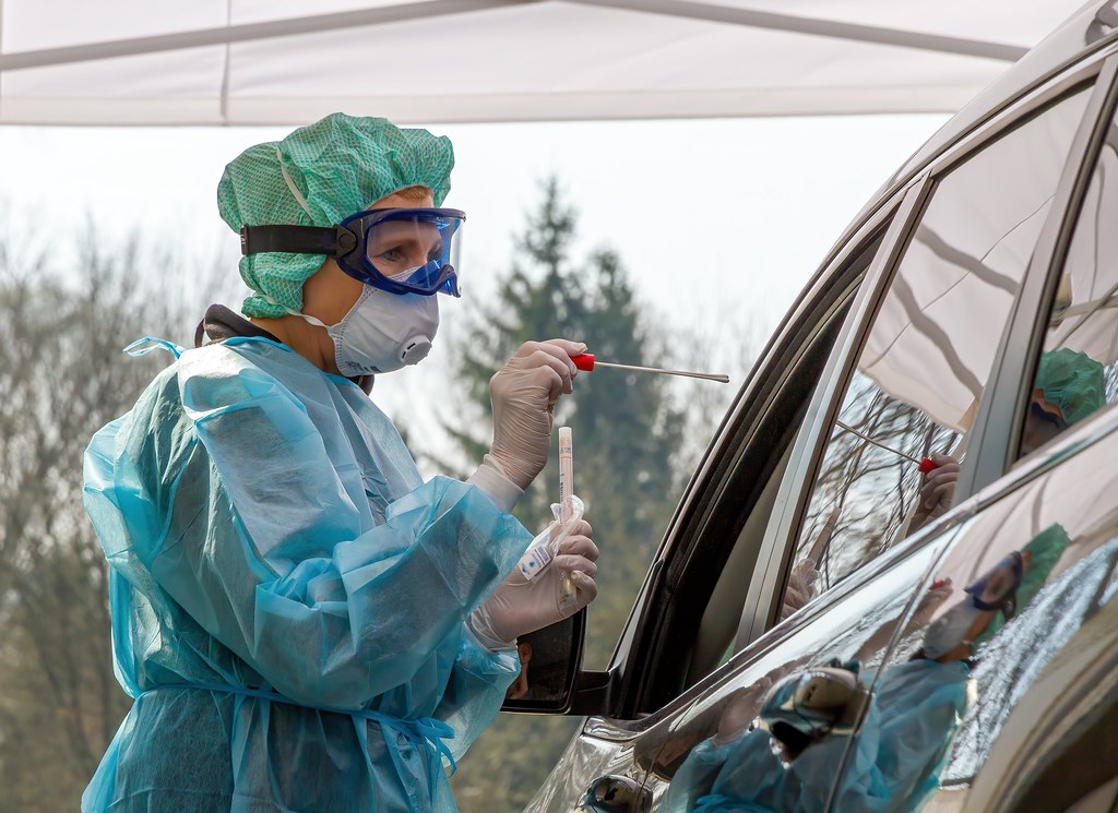 Nurse making a smear, Coronavirus Test on a Drive-In