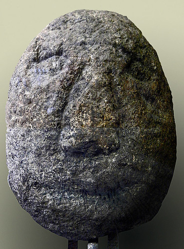 A stone face at the museum in the recreated village called Henllys Iron Age Fort in the area inhabited by Celtic tribespeople over 2000 years ago in Wales