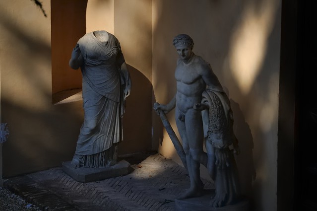 Statues in the shadows - antiquities garden, Capitoline Museums complex, Campidoglio, Rome..