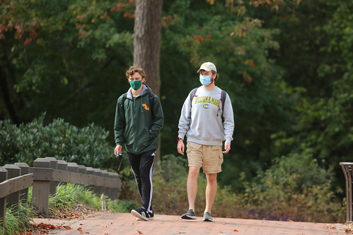 Students walking to class on a fall afternoon.