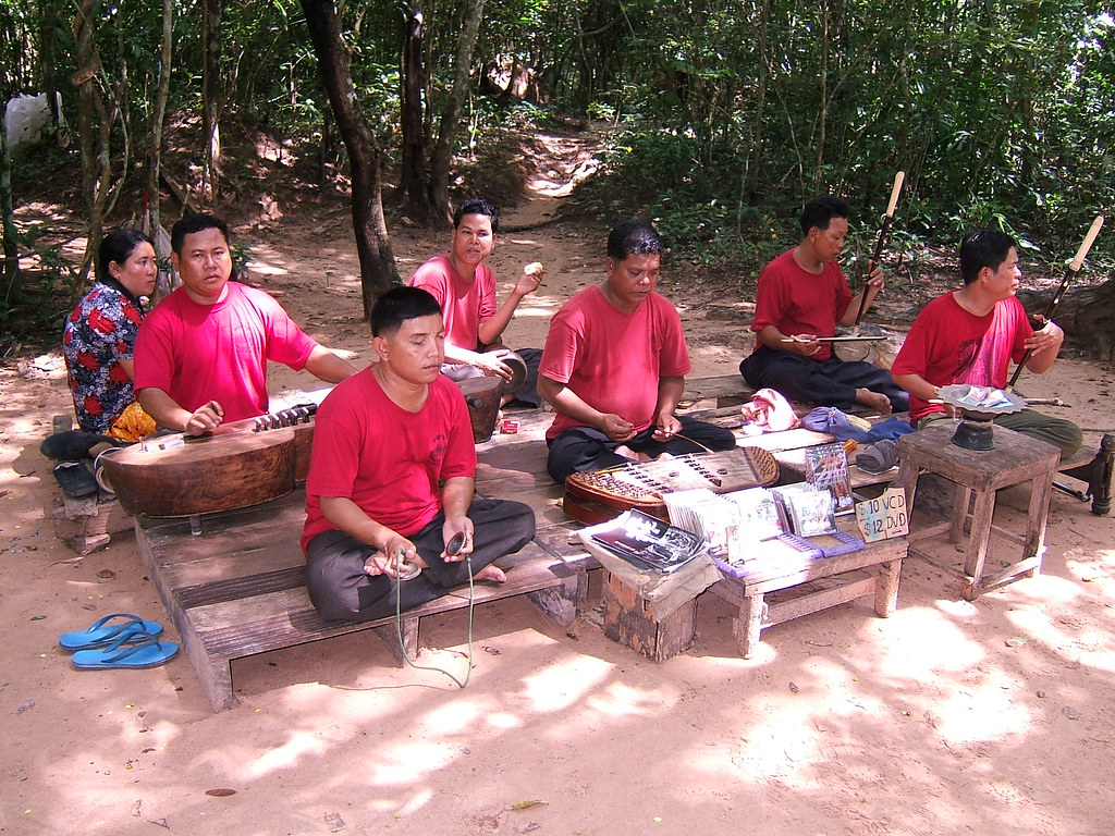 Land mine victims playing traditional musical instruments