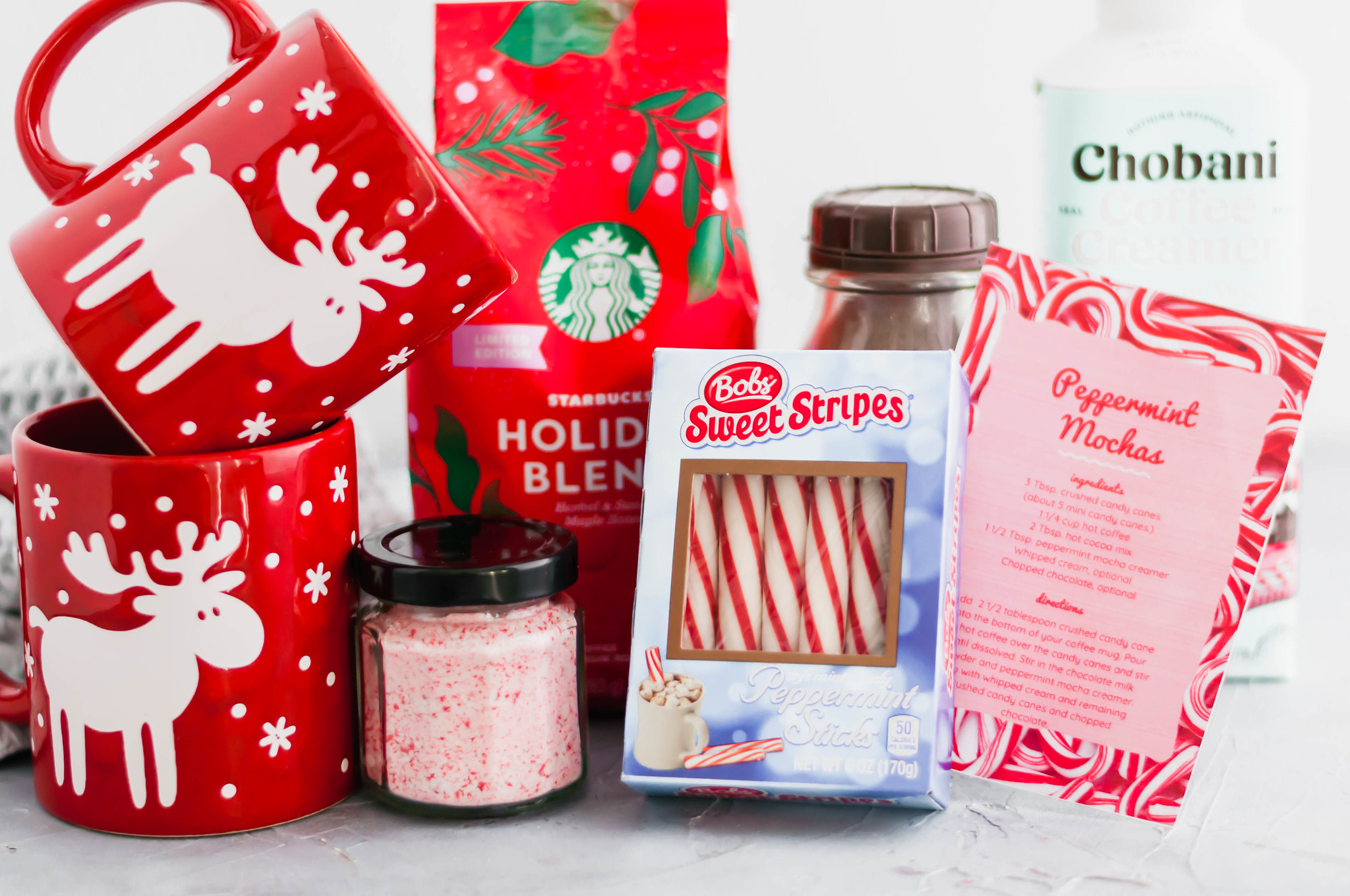 Looking for a fun, festive gift for a coffee lover in your life?! This Peppermint Mocha Kit is simple to put together and totally unique. All the ingredients required to make my delicious peppermint mochas in a fun tin or basket. Include the free printable recipe card so the recipient knows just how to make their delicious peppermint mocha at home.