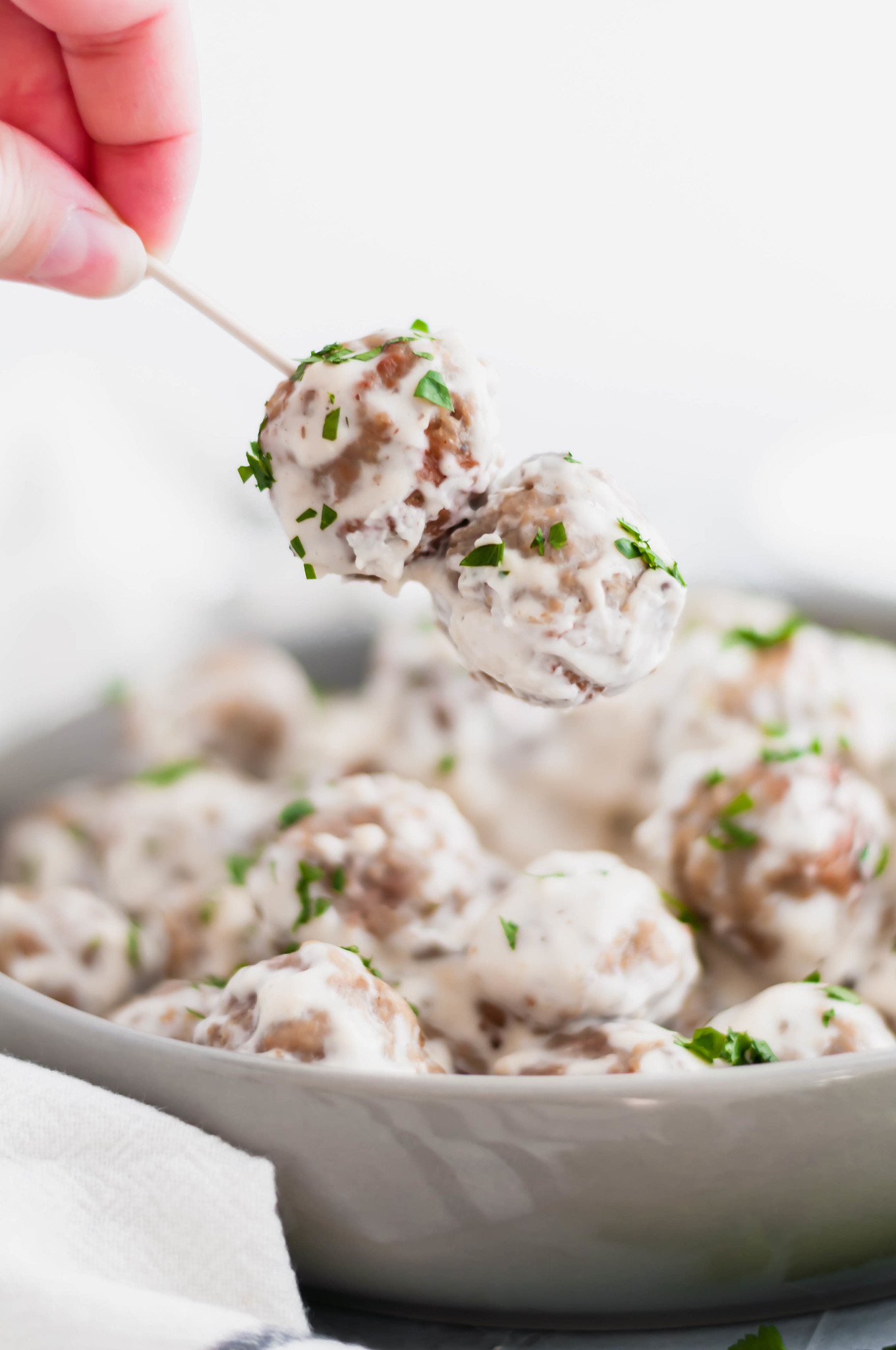 Only 3 ingredients and a few hours in the slow cooker are needed to make these super simple and delicious 3 Ingredient Swedish Meatballs. Great for party or holiday appetizers. A yummy dinner option served over pasta or rice.