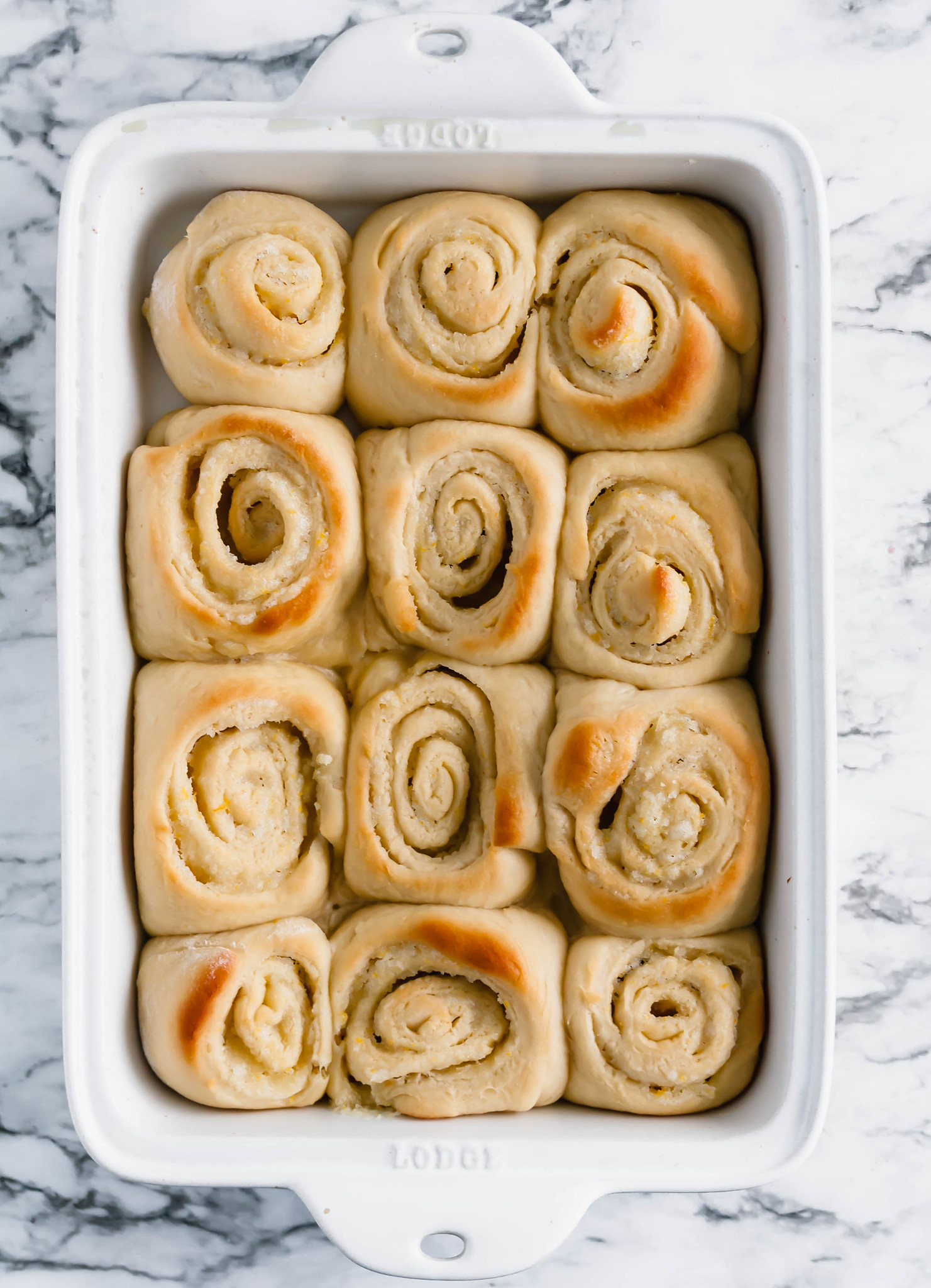 These Homemade Orange Rolls are bursting with fresh, sweet orange flavor. Get ready for tender dough, orange filling and orange scented cream cheese frosting. Perfect Christmas breakfast or weekend breakfast.