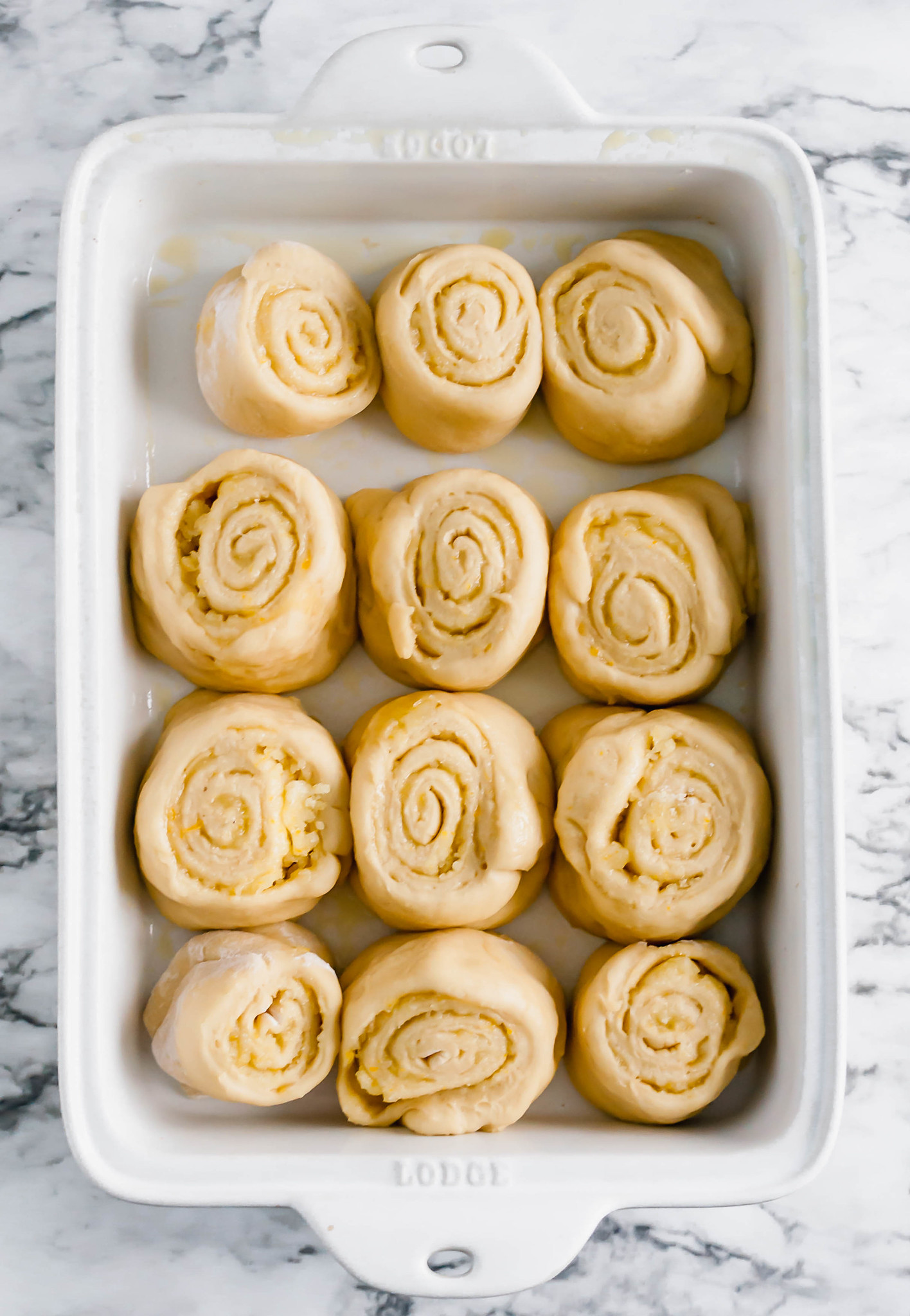 These Homemade Orange Rolls are bursting with fresh, sweet orange flavor. Get ready for tender dough, orange filling and orange scented cream cheese frosting. Perfect Christmas breakfast or weekend breakfast.