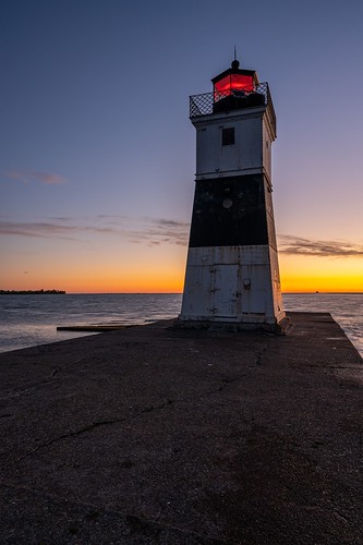 sunrise presque isle north pier lighthouse morning golden hour