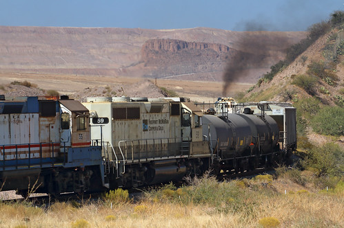 Locomotives, fore and aft by Moffat Road, With the second train’s power shoving on the rear of the stalled train, it now proceeds toward Moren