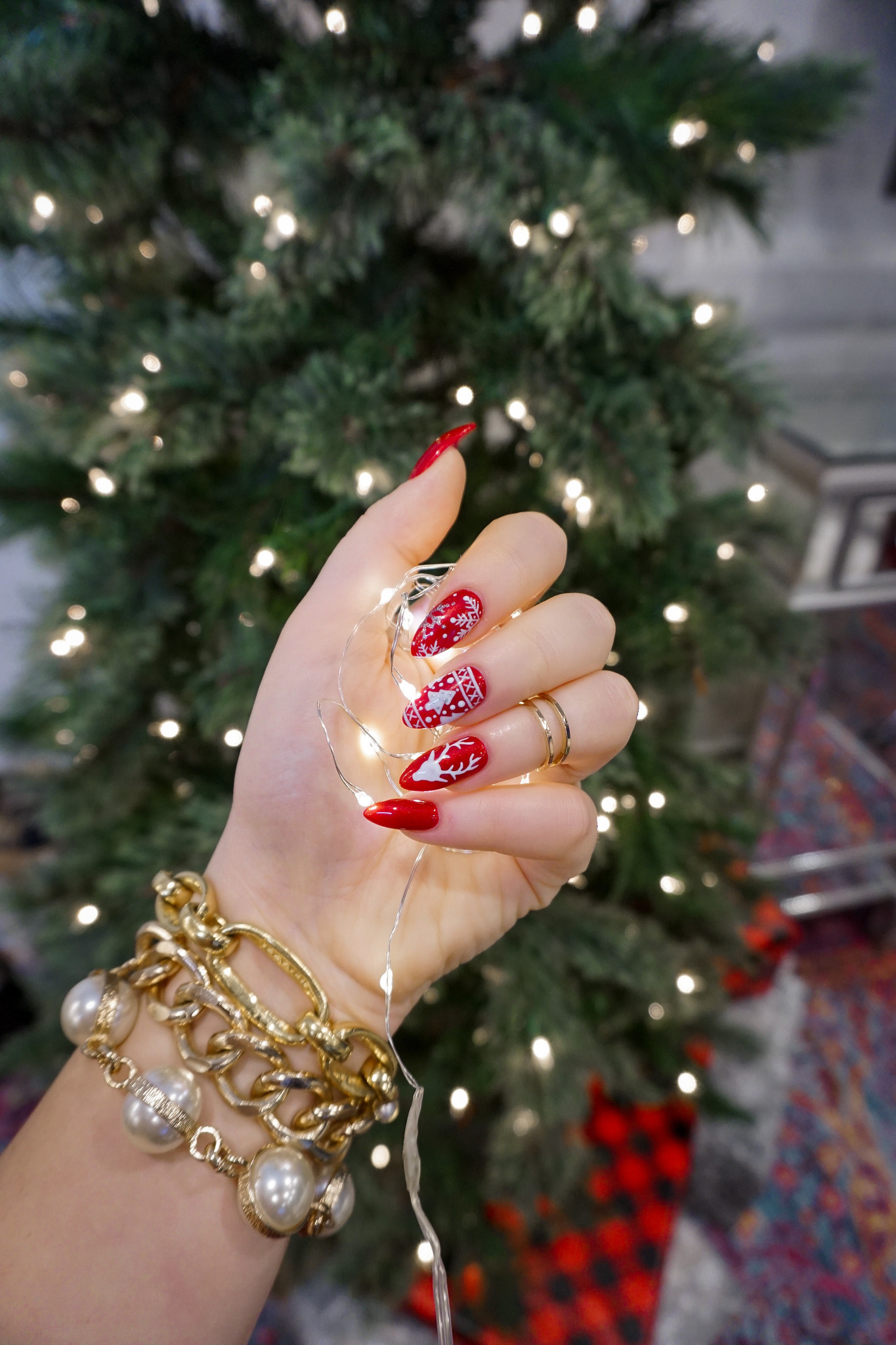 Red Christmas Sweater Nails | Holiday Manicures | Holiday Nails | Cutest Christmas Sweater Nails | Snowflake Nails | Reindeer Nail Art | Christmas Nail Ideas | December Nails | Christmas Lights | Almond Nails 