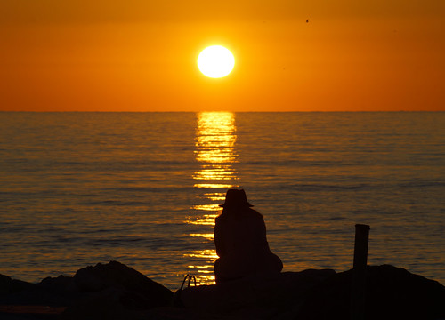 Sunset with a woman and the sea by Andrea D'Angiolo, Sunset with a woman and the seasilhouette seascape sky skyscape landscape hat sonyalpha77 mare cielo