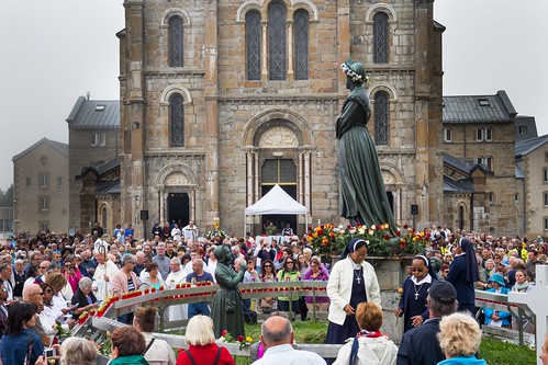 The votive shrine of Our Lady of La Salette stands near the basilica’s main portal and it is a focal point for pilgrims attending outdoor masses. From Great Pilgrimage Sites of Europe. Photo copyright Derry Brabbs