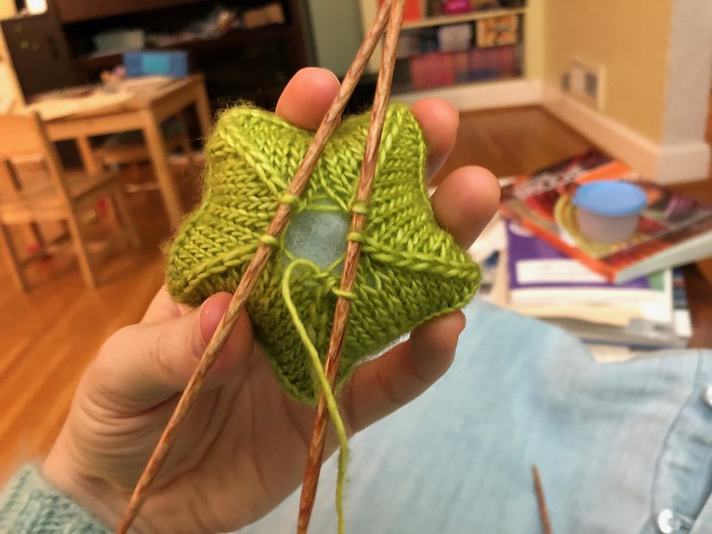Making a star, step 9: just about ready to thread the end through to close up!