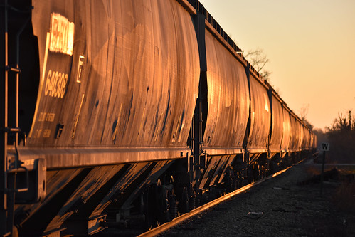 A bitter, cold morning on the Northern by Noah Bolte, A sizeable string of 4-bays marks up the end of CRWA-31 as it heads north toward Waterloo, IA on a f