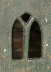 peephole window cut in the roodscreen