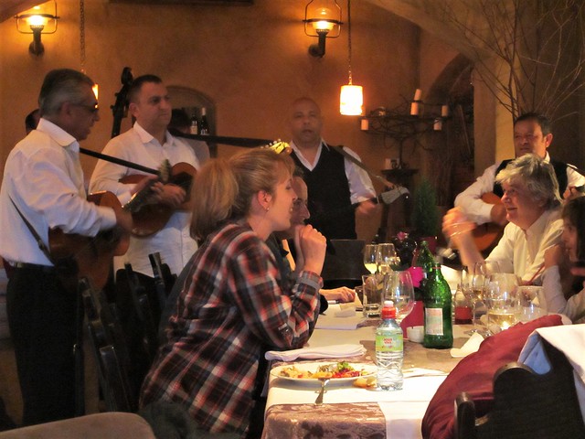 Musicians serenade diners at Restoran Šaran, Zemun, Serbia