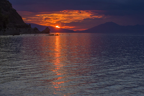 Scenic view by n.pantazis, outdoors sunset clouds sea rocks colors red akrata platanos pentaxk70 tamron