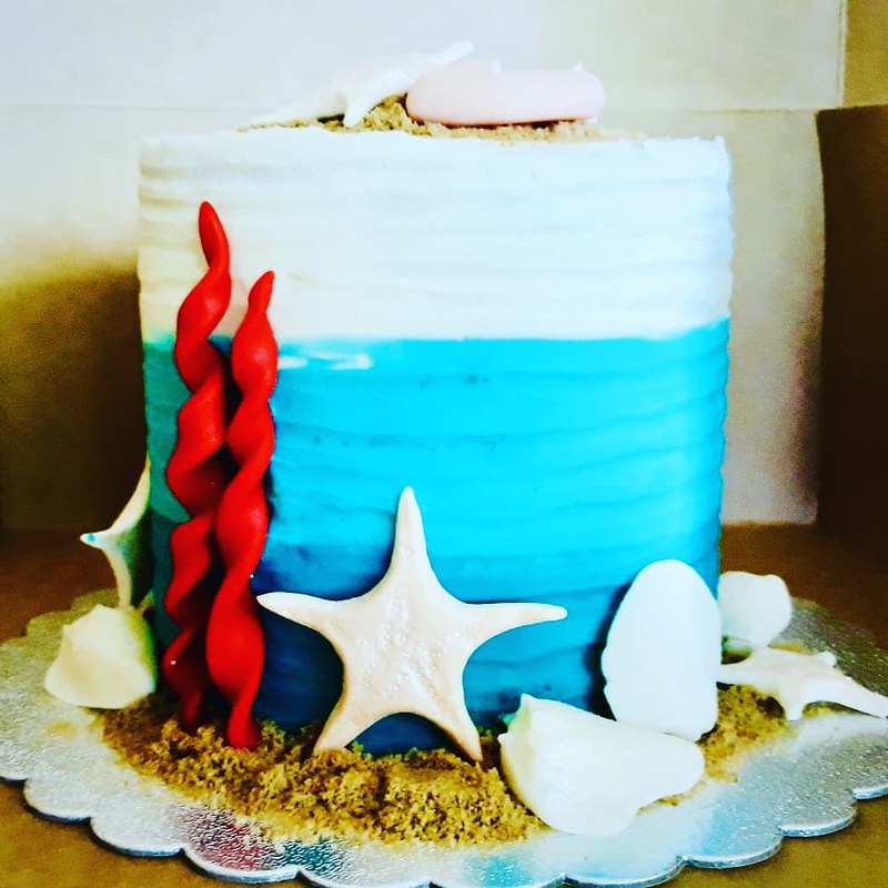 Beach Themed Blue Ombre Cake with fondant shells and seaweed and Graham Cracker Crumb 'sand' from Cakes by Cammy