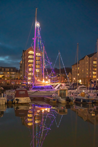 tramsteer portishead marina lights boats decorations reflections water street somerset goldenhour sunset