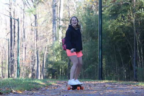 A W&M student enjoys skateboarding on Monticello Avenue's new bike path.