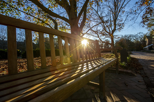 Campus benches sit empty with students now home for an extended winter break.