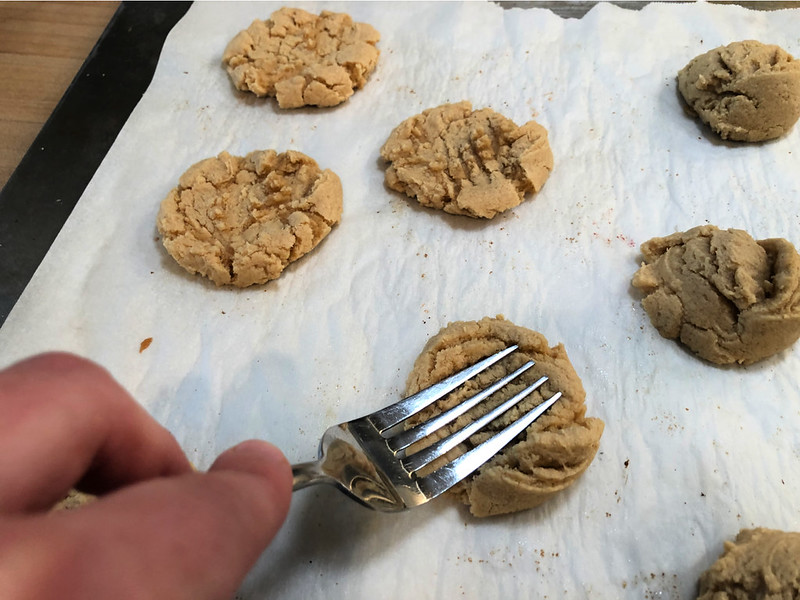 flatten cookies with a fork.