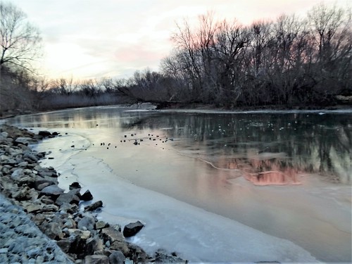 frozen river owatonna minnesota sunset straightriver reflections