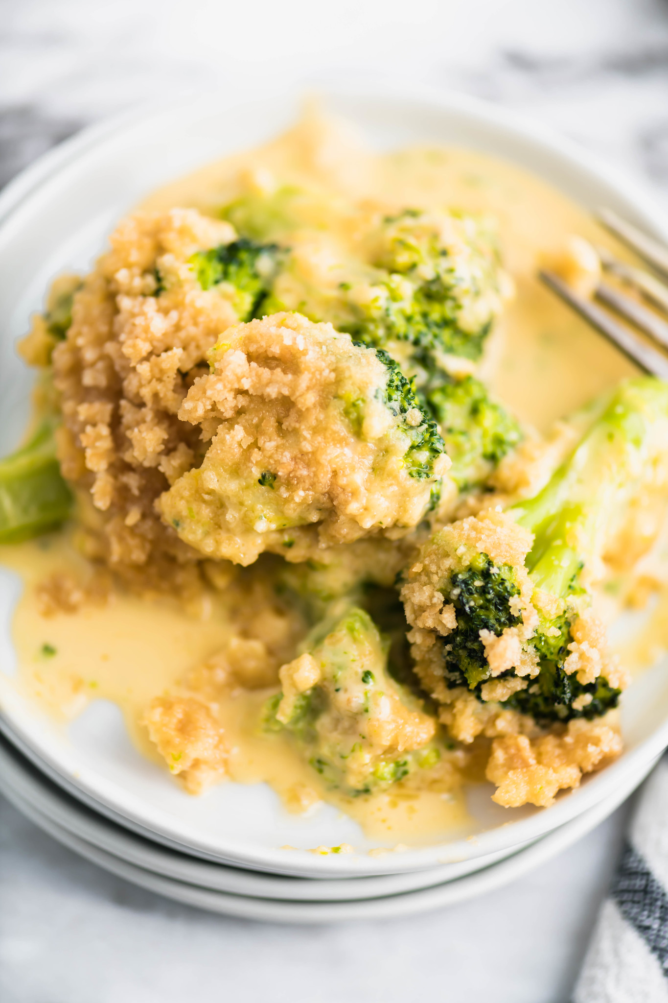 Broccoli Cheese Casserole is a super easy, totally addictive casserole that's perfect for the holidays. Only 4 ingredients needed for this cheesy vegetable side dish.