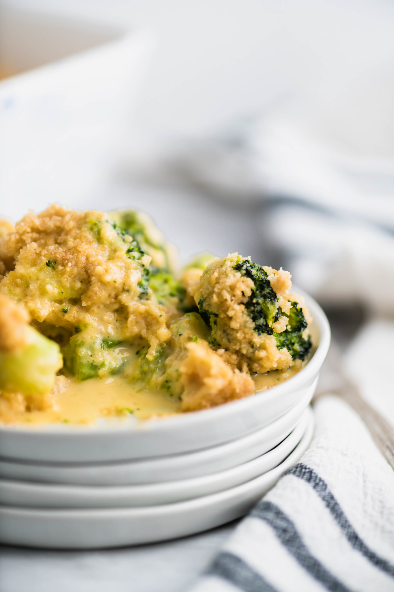 Broccoli Cheese Casserole is a super easy, totally addictive casserole that's perfect for the holidays. Only 4 ingredients needed for this cheesy vegetable side dish.