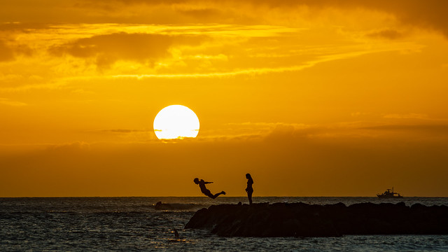 Splash and sunset in Waikiki