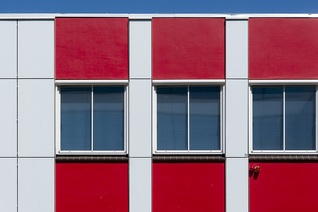 Facade with six red panels
