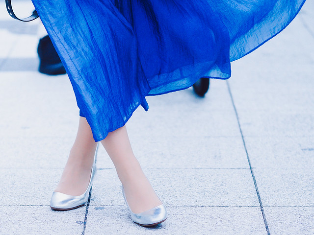 Woman in blue skirt