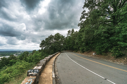 Mountaintop Road by 75CentralPhotography, A road curves around a mountaintop overlooking Hot Springs, Arkansas.arkansas clouds color colors co