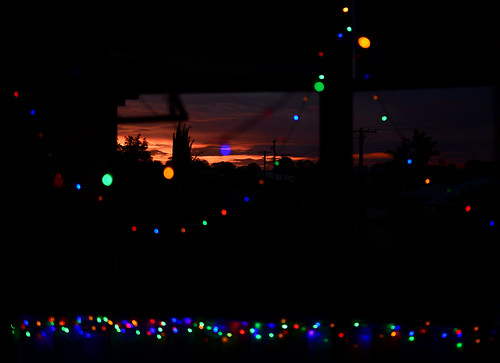 2020 nikond850 sunset tamron35mmf18 bundaberg queensland australia christmaslights 25th december palmtrees powerlines powerpoles clouds redsunset orangesunset