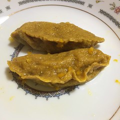 Pumpkin stuffed turmeric ravioli