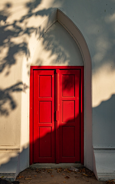 Shadows Across Red Door