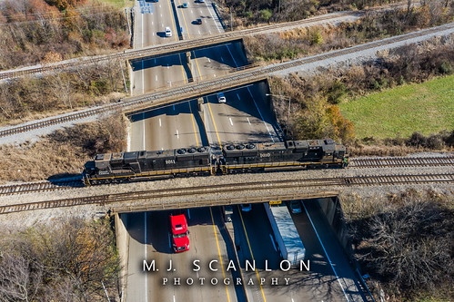 IC 1010 IC 1011 | EMD SD70 | CN Memphis Subdivision by M.J. Scanlon, The light power of CN RJY30 crosses over Interstate 55 on CN City Main 2 in South Memphis.business c
