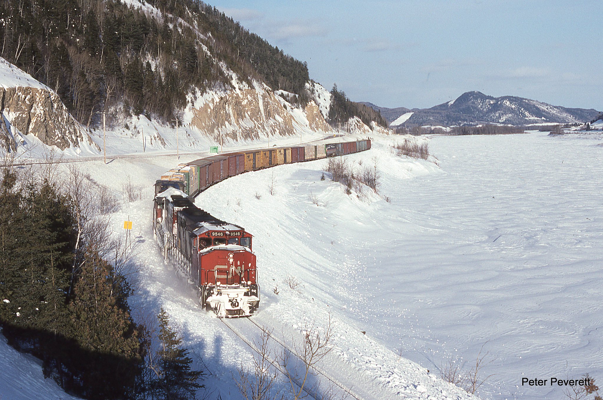 CN Train 313 GP-40-2 # 9546, 9617 and M-420 # 3569 Matapedia, Quebec Feb.17, 1995. The second unit was the leader the day before and shows the results of drift busting.  