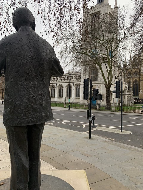 Nelson Mandela looking towards St Margaret’s Church next door to Westminster Abbey.