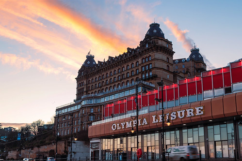 grandhotel buildings architecture arcade bowling oympia city town cityscape lowangleofview sunset dusk evening canon scarborough nothyorkshire yorkshire england unitedkingdom