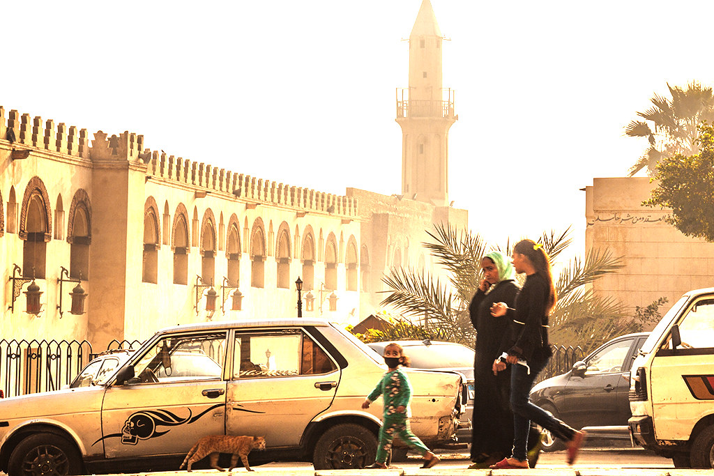 Two women, girl, cat and car with skull in Old Cairo on 1-3-21--Cairo
