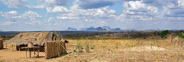 Farmstead and distant inselbergs, Reserva do Niassa,  Mozambique