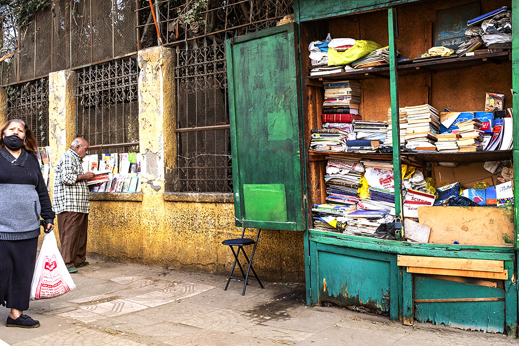 Sidewalk bookseller in Gazirat Badran on 1-6-21--Cairo